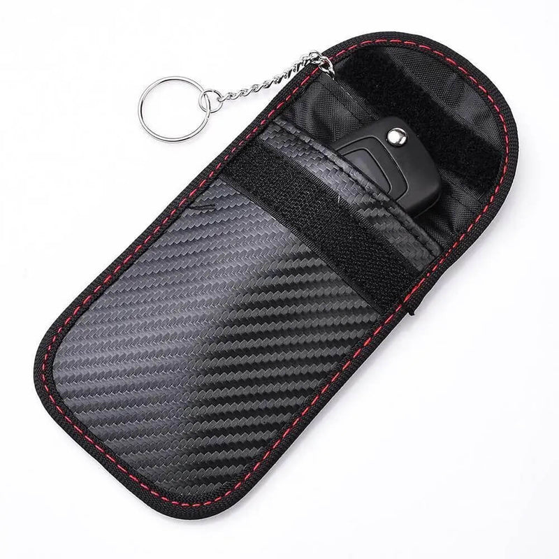 Load image into Gallery viewer, Bolsa Faraday moto – detalhe do material TPU e revestimento fibra de carbono

